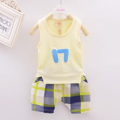 Sleeveless Green Tank Top with Plaid Shorts